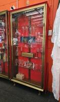 DISPLAY CASE: An antique brass, single door, shallow display case. Measures 197cm high, 96cm wide, 24cm deep - 2