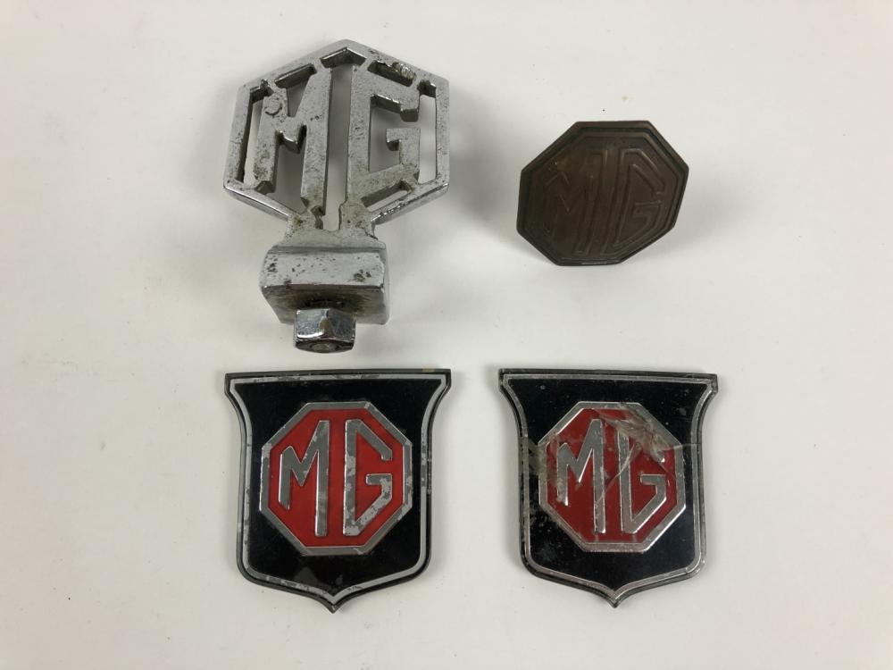 M.G: Four M.G car badges including a chrome double sided logo - Price  Estimate: $ - $