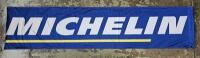 MICHELIN: A large, modern 'MICHELIN' cloth banner. Banner with dimension of 2.9m in height, 65.5cm in width