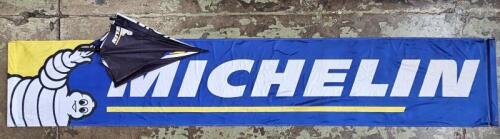 MICHELIN: A large, modern 'MICHELIN' cloth banner & Bibendum Umbrella. Banner with approximate dimensions of 3.6m in height, 65.5cm in width