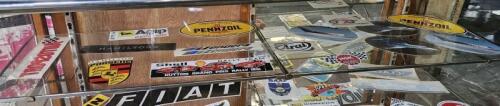 ADHESIVES: A collection of adhesives including 'Agip motor oils', 'Arai', 'PENNZOIL, Zender