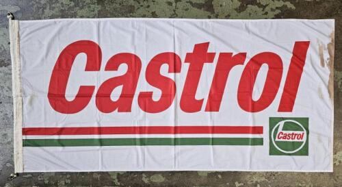 CASTROL: A large white 'Castrol' cloth flag. Flag measures 184cm wide, 87cm high overall