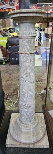 MARBLE PEDESTAL: A marble pedestal in the form of a column