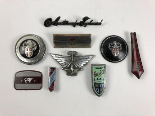 AUSTIN: A collection of Austin car badges, including 'Austin of England' badge&nbsp;