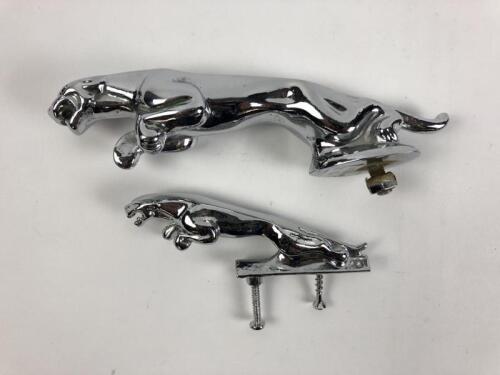 JAGUAR: Two Jaguar mascots. Both chrome on brass/bronze