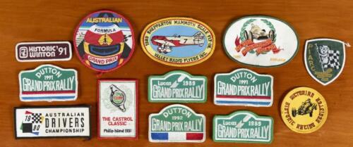 BADGES: A collection of cloth and embroidered badges. '1990 AUSTRALIAN DRIVER CHAMPIONSHIP', 'DUTTON GRAND PRIX RALLY', 'HISTORIC WINTON '91', 'PIARC' badges