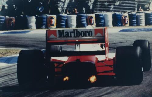 SENNA: A reprinted colour picture, after the original by Geoff Morrow, of Ayrton Senna racing a McLaren-Honda at the Australian Grand Prix, Adelaide