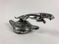 JAGUAR: A Jaguar 'Knock On' wheel hub cover with Jaguar Mascot