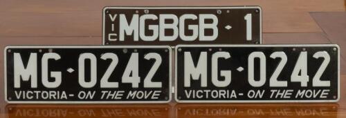 MG: Three black and white MG number plates. Pair of 'MG-0242' plates