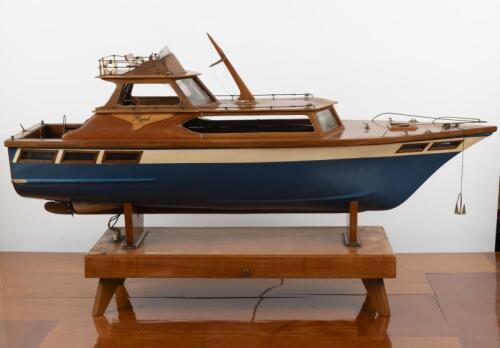WOODEN BOAT: A large impressive wooden boat - 'RAJAH'. Boat measures 105cm long, 58cm high with 33cm beam