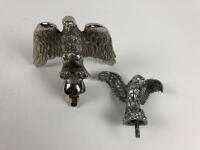 EAGLE MASCOT: Two chrome eagle mascots