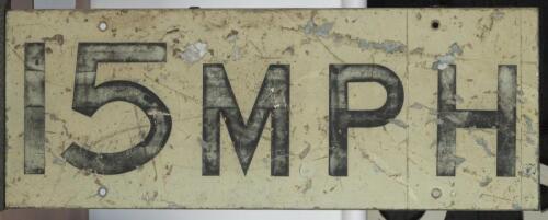 15 MPH: A metal '15 MPH' reflective sign, 122cm wide, 46cm high, 3cm deep
