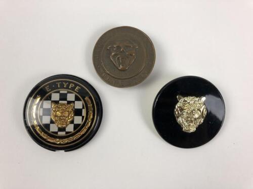 JAGUAR: Three Jaguar car badges. E-Type badge