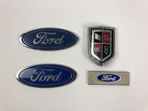 FORD: Four Ford car badges. Canadian Ford car badge