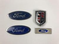 FORD: Four Ford car badges. Canadian Ford car badge
