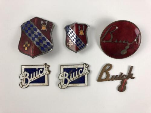 BUICK: A group of Buick car badges