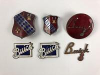 BUICK: A group of Buick car badges