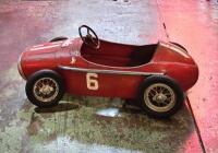 FERRARI: A rare 1950s childs' pedal Ferrari racing car by Morellet Guerineau, French, likely modelled on a Ferrari 375 F1, pressed metal body, very original, 110cm long