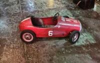 FERRARI: A rare 1950s childs' pedal Ferrari racing car by Morellet Guerineau, French, likely modelled on a Ferrari 375 F1, pressed metal body, very original, 110cm long - 2