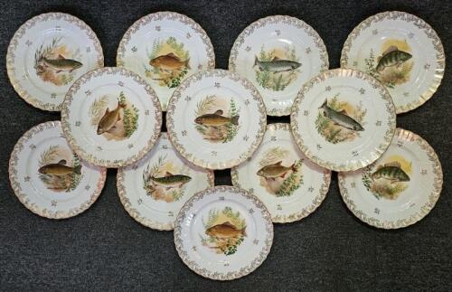 PORCELAIN: Twelve 20th century B & C Bernardaud (Limoges, France) hand painted fish themed cabinet plates, 24.5cm diameter