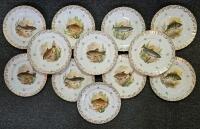 PORCELAIN: Twelve 20th century B & C Bernardaud (Limoges, France) hand painted fish themed cabinet plates, 24.5cm diameter