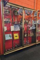 DISPLAY CASE: An antique brass double door, shallow display case. measures 198 cm high, 182cm wide, 61.5cm deep