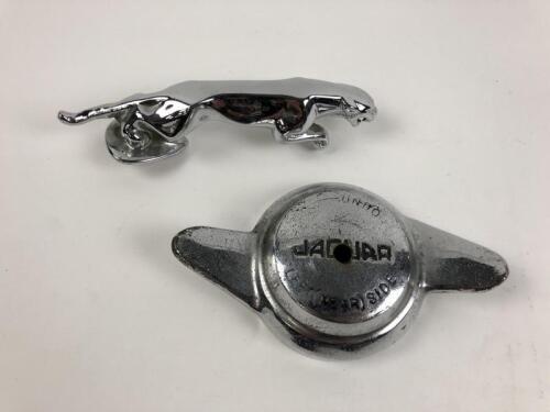 JAGUAR: Two Jaguar related items. Mascot and wheel hub cover
