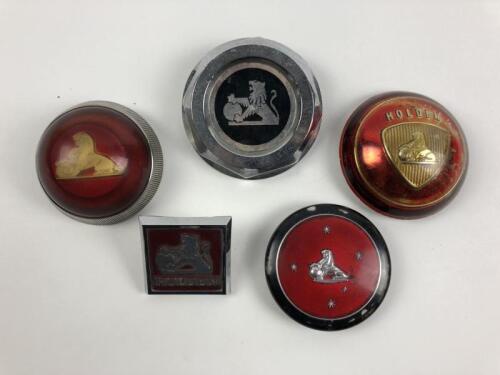 HOLDEN: A group of Holden badges, two being steering wheel centre motifs