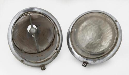 356: A pair of Porsche 356 headlights, one complete, one with missing lens and damage to chrome rim.