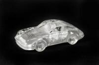 CRYSTAL 911: A crystal paperweight model of Porsche 911 fitted in a Porsche AG Shell 911 tin (16cm long) - 2
