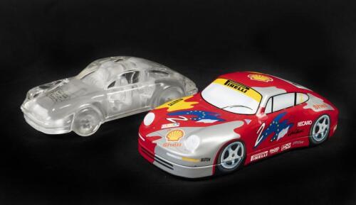 CRYSTAL 911: A crystal paperweight model of Porsche 911 fitted in a Porsche AG Shell 911 tin (16cm long)