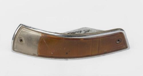 PORSCHE: A left front turn signal housing with lens for Porsche 911/912 for 1965-1968 models, European Spec.