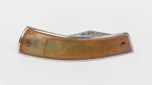 PORSCHE: A left front turn signal housing with lens for Porsche 911/912 for 1965-1968 models, USA Spec.