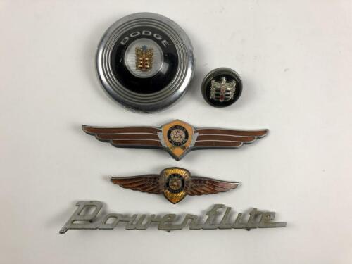 DODGE: A group of Dodge items. Hub cap cover