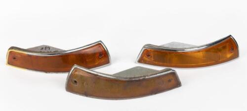 PORSCHE: Three Porsche turn signal housing and lenses for US-spec Porsche 911/912 1965-1968 models. Two right and one left