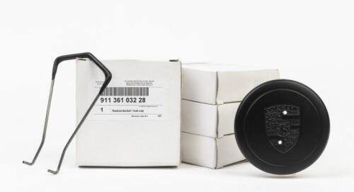 CENTRE WHEEL CAPS: A set of four unused centre wheel hub caps (911 361 032 28) for FUCHS wheels