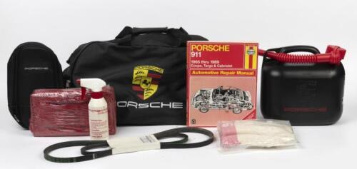 PORSCHE KIT: A black 'PORSCHE' bag with contents.