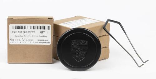 CENTRE WHEEL CAPS: A set of four unused centre wheel hub caps (911 361 032 28) for FUCHS wheels