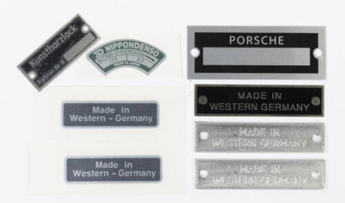 PLAQUES: A group of car plaques. 'MADE IN WESTERN GERMANY', 'NIPPONDENSO' & 'PORSCHE' plaques