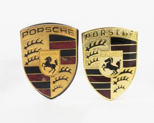 PORSCHE: Two PORSCHE badges. Part Numbers 901 559 210 20 & 993 559 211 00