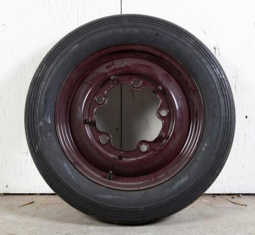 356 PRE A: A Porsche 356 'Pre A' spare wheel coated in red/burgundy