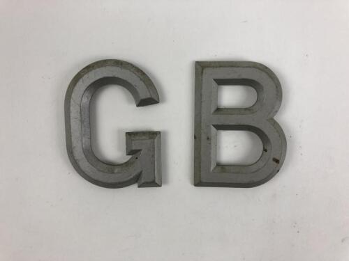 GB: GB logo in silver