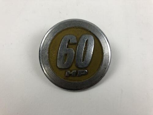 TRACTOR: A '60 HP' circular badge