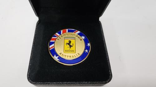 FERRARI MEMBERS MEDALLION: A 2006 Ferrari Club Australia enamelled medallion in presentation box, 5cm diameter