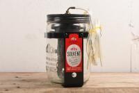 WINDSCREEN WASHER: A TRICO Solvent Windscreen Washer vacuum bottle and holder. Suitable for British makes