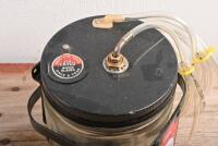 WINDSCREEN WASHER: A TRICO Solvent Windscreen Washer vacuum bottle and holder. Suitable for British makes - 3