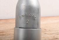 OIL BOTTLE: A 1920s - 1950s aluminium alloy 300 ML 'Reilang' oil bottle with bolt on base - 2