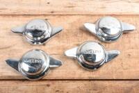 SPINNERS: Four original Jaguar wheel spinners