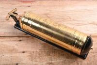 PYRENE FIRE EXTINGUISHER: A Pyrene brass fire extinguisher