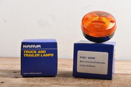 60 · TAIL LIGHTS: A pair of new old stock NARVA amber rear direction lamps